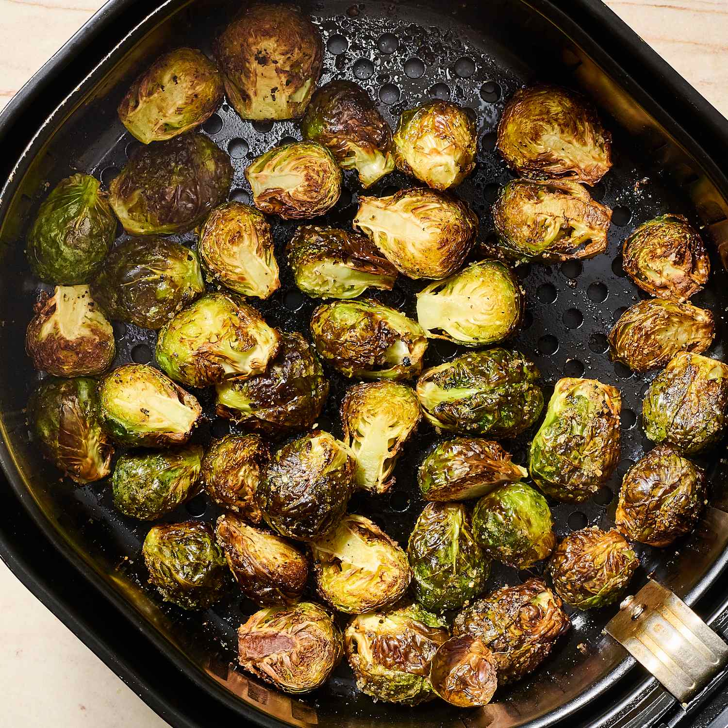 Crispy air fryer Brussels sprouts with balsamic glaze - quick family meal.